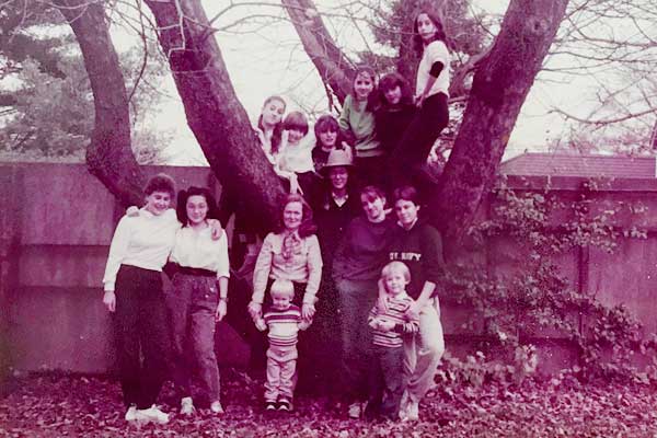 Dorm students by the apple tree