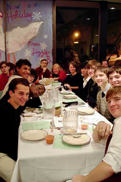 students at dinner party