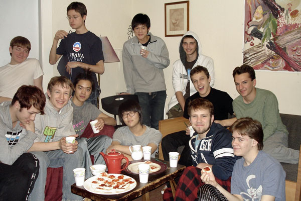 student drinking tea and eating scones