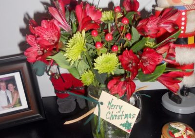 Flowers with Merry Christmas label