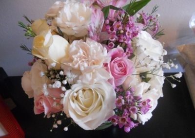 Flower arrangement with pink and white roses
