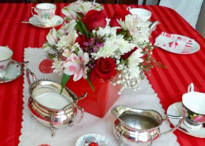 Flower arrangement and silver tea set
