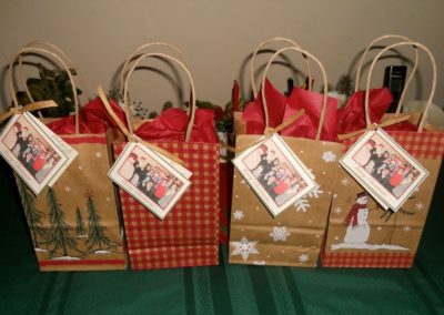 Four Christmas bags with gifts