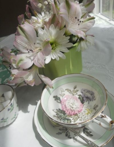 Traditional cup and saucer and flowers