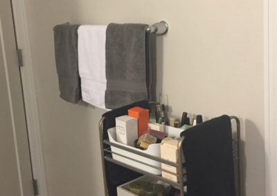 Gray and white towels in bathroom