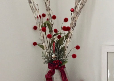 Twigs and berries in vase